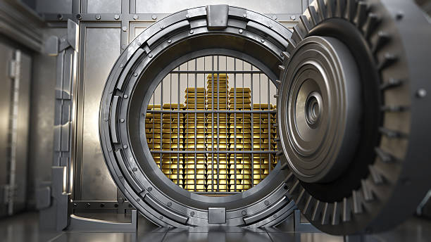 A secure vault door is partially open, revealing stacks of gold bars inside. The metallic interior emphasizes security and wealth. This scene highlights financial stability.